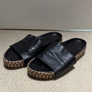 Beek Black Leather Mules with Woven Detail